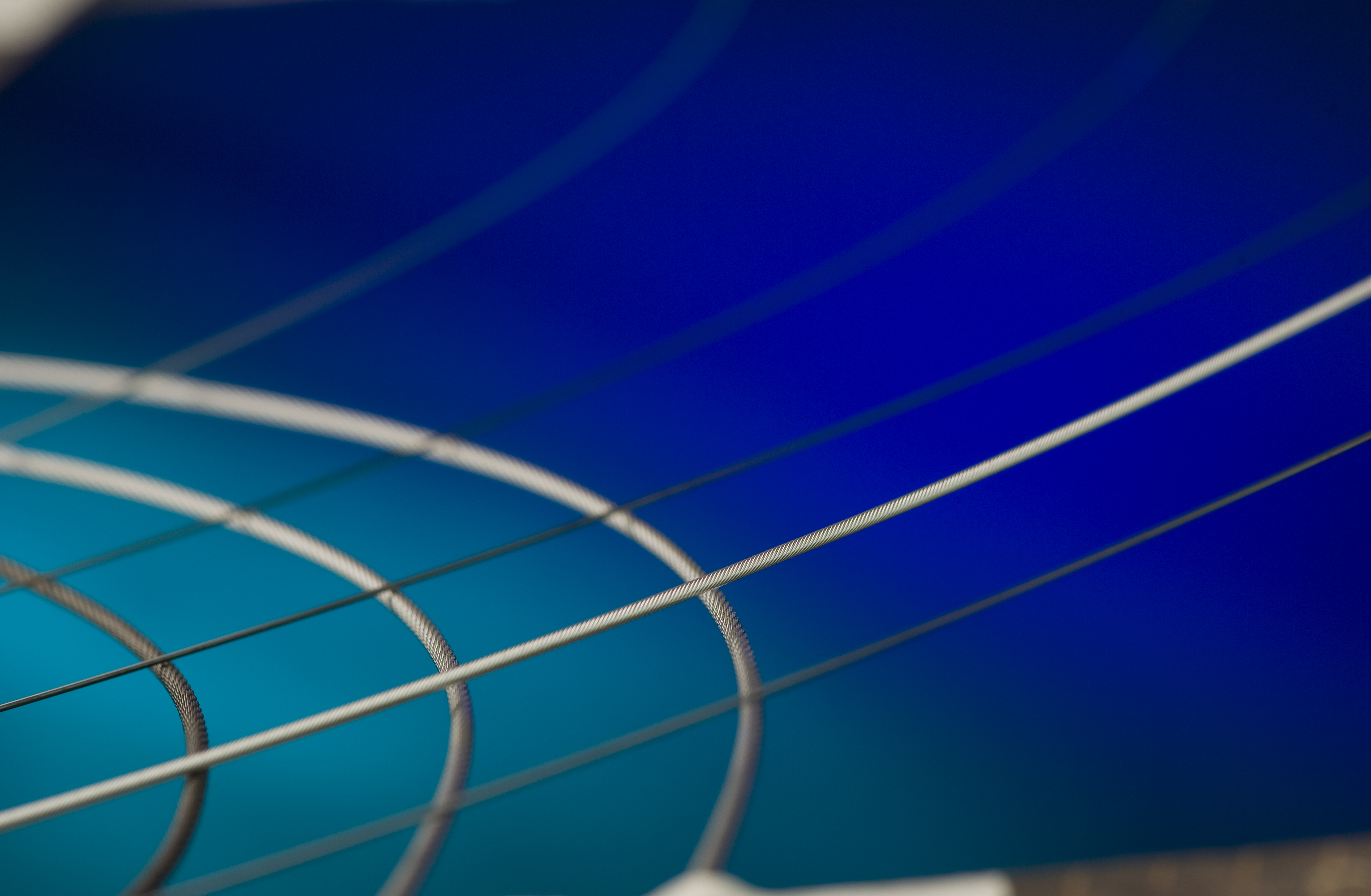 Super-elastic alloys with gigapascal plateau strengths: Advancing medical and space applications